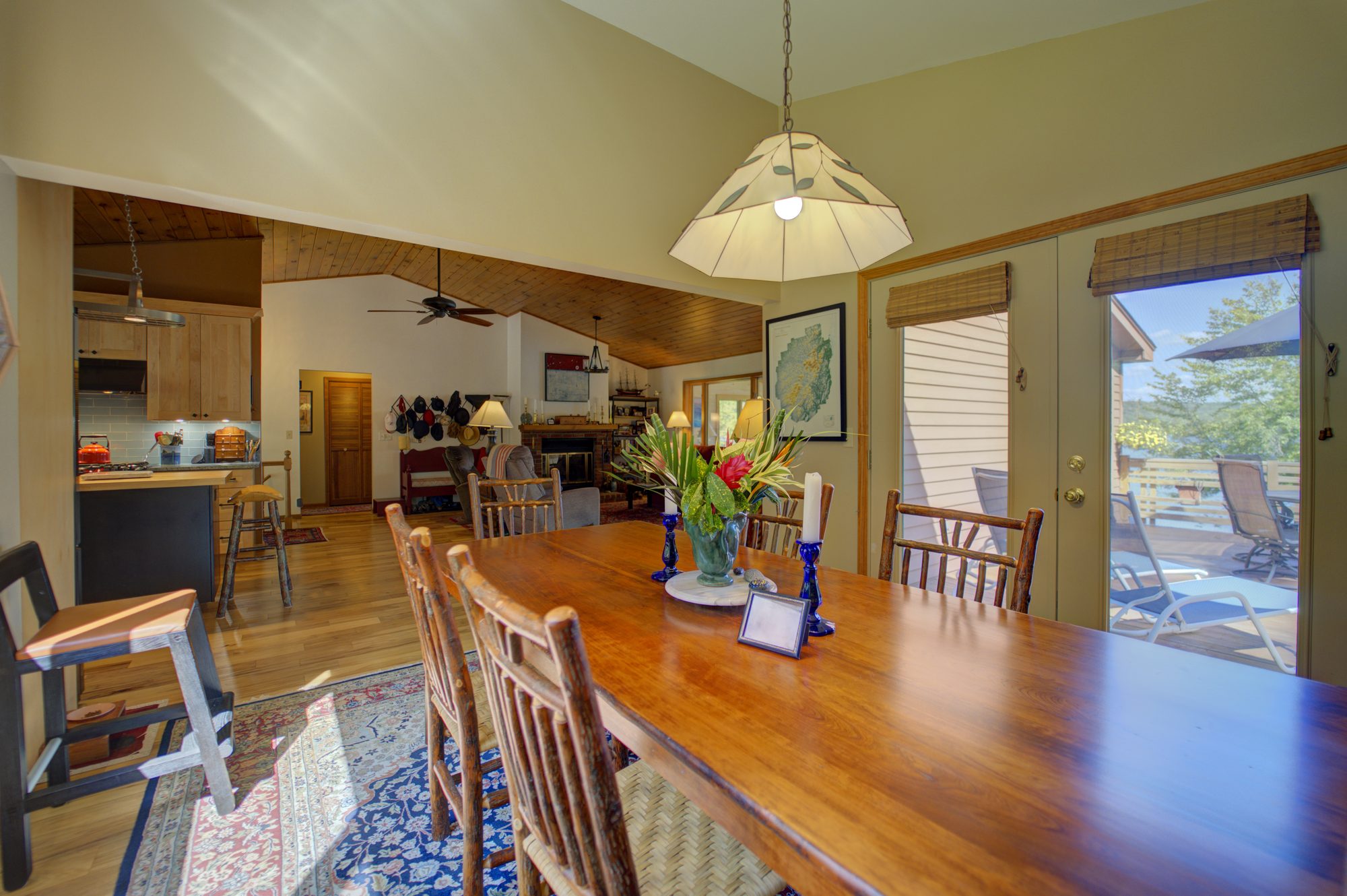High ceiling open living room with restored hardwood floors in Troy NY